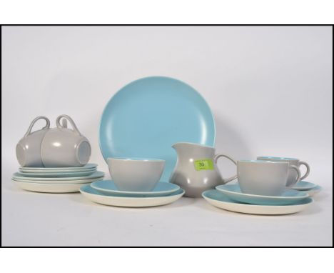 A lovely 20th century vintage / retro Poole Pottery tea service in the grey and blue colour way.