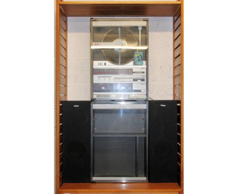 A vintage modular 1970's / 1980's Bush upright audio system 9000 having vertical record player, hi-fi with tape decks etc set