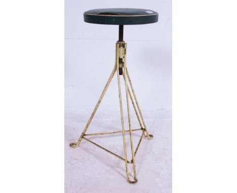 A vintage 20th century blue and white pipe edged machinists chair raised on white metal hairpin style legs. Measures: 62cm x 