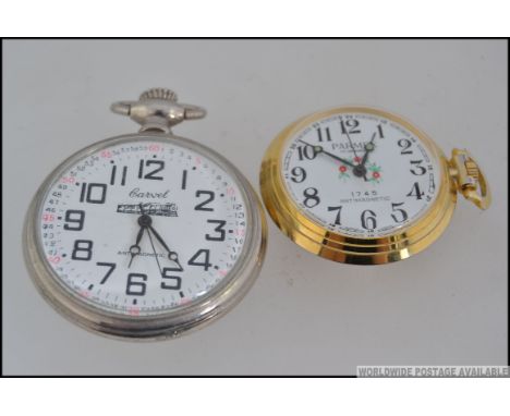 A 20th century Carvel open pocket watch having white metal case with Turksh crest and train emblem to rear. Together with ano