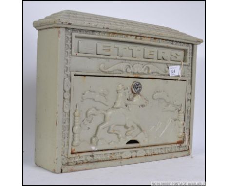 A 20th century metal letter box with decorative hunting scenes facia ( see illustration )