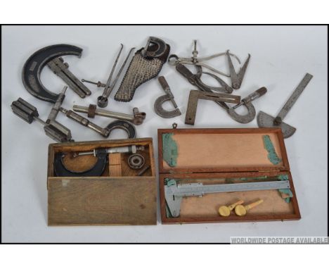 A collection of vintage engineers tools to include Micrometers, Vernier gauges etc. All belonging to the vendors father who w