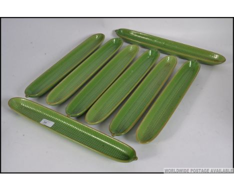 A collection of 8 1970's ceramic vintage green glazed sweetcorn dishes - retro kitchenalia. Measures: 42cm L.