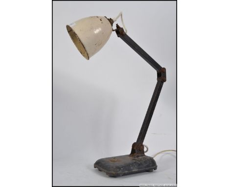 A vintage / retro industrial early to mid 20th century anglepoise style desk lamp, having a white painted pendant shade, supp