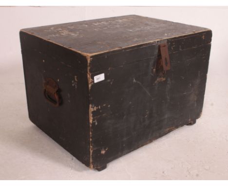 A Victorian ebonised pine military stemer trunk chest with hinged top having notation for RJ Mesney. Measures: 40cm x 63cm x 