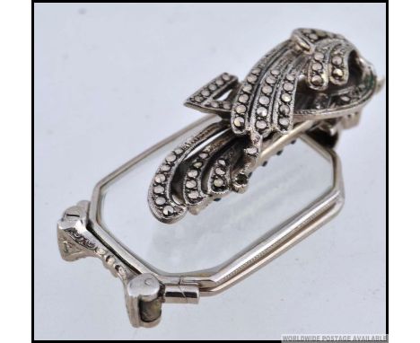 Retro vintage pair of lorgnette spectacles. Marcasite setting in white metal.
The folding mechanism is perfect and a tiny cat