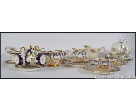 A beautiful George Jones Crescent China part tea service Rd 269725 together with a part Paragon service in green and another 