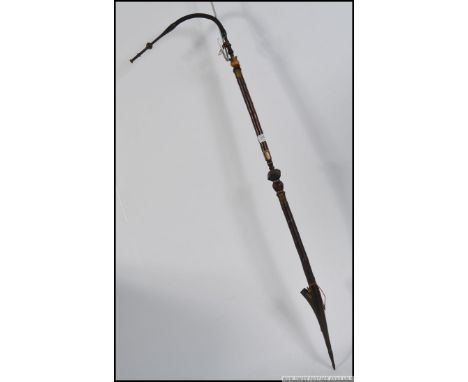 A late 19th early 20th century hazel and horn sectional Hookah pipe, having what appear to be applied military pips and numbe