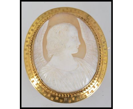 A stunning large Art Deco tested 9ct gold mounted carved shell Cameo pendant brooch pin depicting the Angel Gabriel. Mounted 