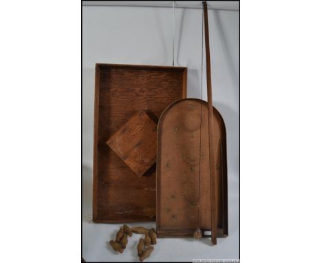 A vintage bar billiards table complete all the pins along with a vintage bagatelle board