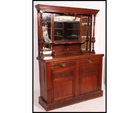 Edwardian mahogany mirror back Chiffonier sideboard.  The base with drawers and double door cupboard. Above a mirror back upr