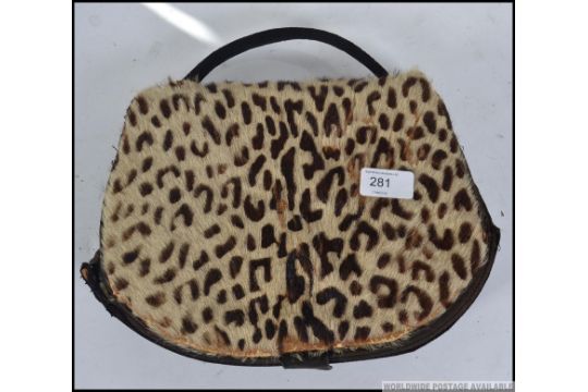 leopard skin clutch bag