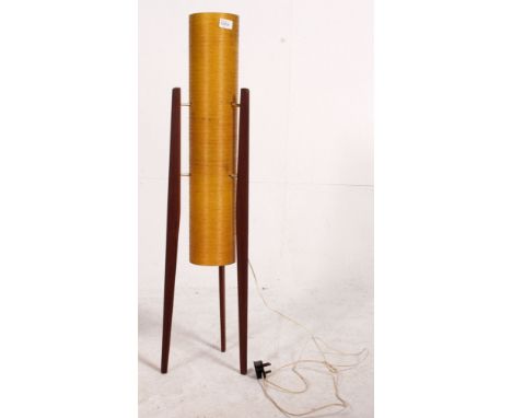 A 1950's teak and fibre glass sputnik / rocket lamp raised on angled teak supports with original shade. Measures: 94cm x 20cm