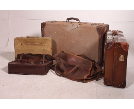 A good collection of vintage suitcases to include good leather holdall, suitcases, attache, 1950's vanity etc. Measures: 75cm