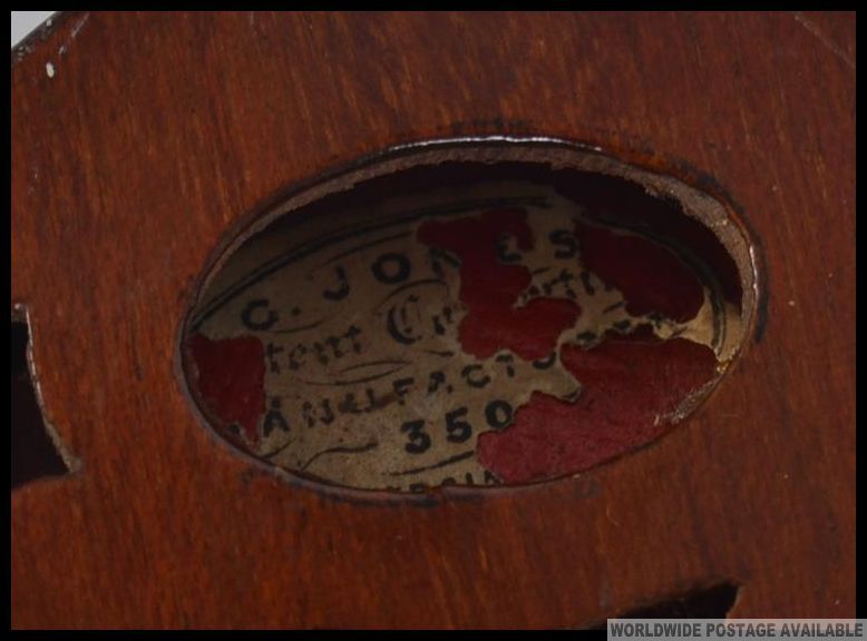 A Victorian mahogany squeeze box musical instrument. The box with