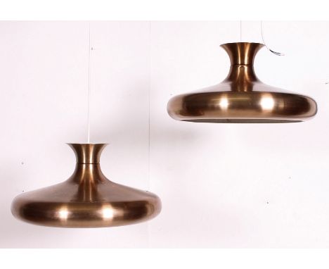A pair of polished metal retro 20th century conical pendant lamp shades of modernist form. Matching further pair in lot 1154a