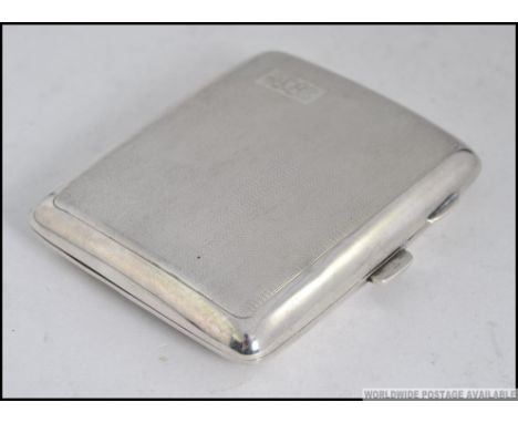 A silver hallmarked engine turned cigarette / cheroot holder bearing hallmarks for Birmingham 64.9g Measures: 9cm L.