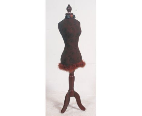 A 20th cenutry tailors / shop haberdashery dummy / dressmakers mannequin raised on tripod support.  120cm H