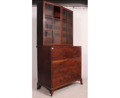 A Georgian mahogany secretaire  / bureau bookcase having fall front and pull out appointed desk over chest of drawers with bo