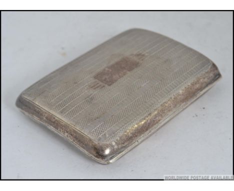 A silver hallmarked engine turned Cheroot / Cigarette case, with assay marks for Birmingham 50g Measures: 8cm L