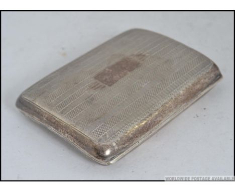 A silver hallmarked engine turned Cheroot / Cigarette case, with assay marks for Birmingham 50g Measures: 8cm L