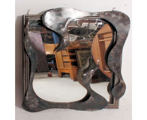 An unusual contemporary / modernist brutalist  large Art wall mirror. Of square form with metal frame having embellished shee