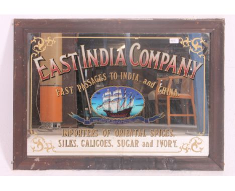 A good East India Company pub / shop mirror from the 20th century. Wooden framed with central mirror having notation for East