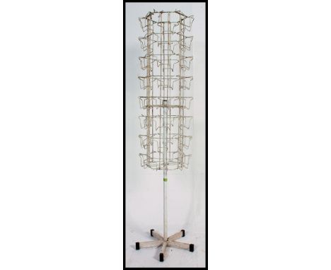 A vintage 20th century wirework shop Industrial card / paper stand of revolving form with 5 leg base 163x40cm