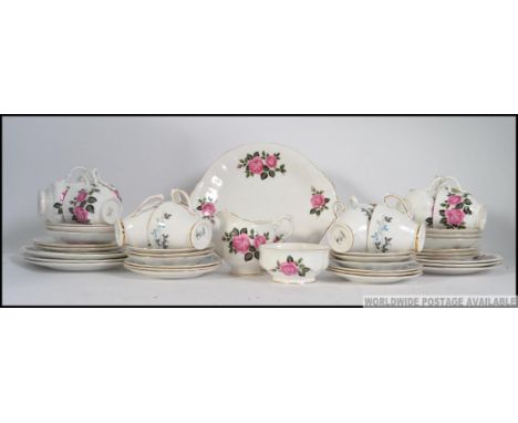 A Royal Trent part tea service in a chintz floral pattern together with another to include cups, saucers, plates etc