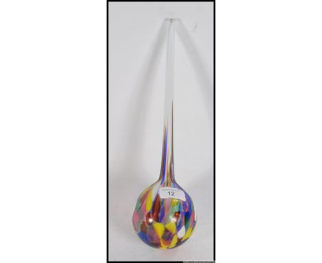 A stunning 20th century studio art glass watering globe. The globe base with coloured body and tapering stem. Measures: 34cm 