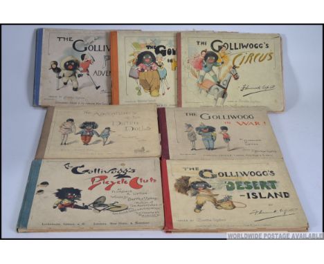 A collection of ' The Golliwogg's books ' by Florence K Upton, words by Berth Upton. To include Biycyle Club, In War!, Desert