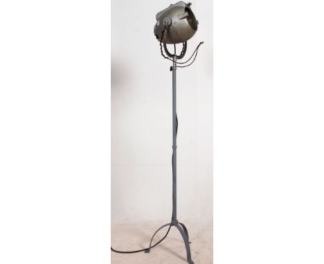 A vintage mid century Industrial Strand theatre spot light / lamp complete with tripod, the light casing marked for Strand. M