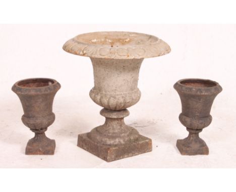 A collection of 3 vintage early 20th century cast iron garden campana urns, 2 x small and 1 x large ( see illustrations ) Mea