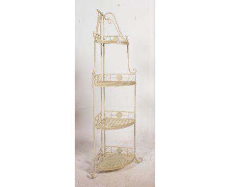 A contemporary painted metal shabby chic vintage folding corner plant stand whatnot / etargere of lattice construction