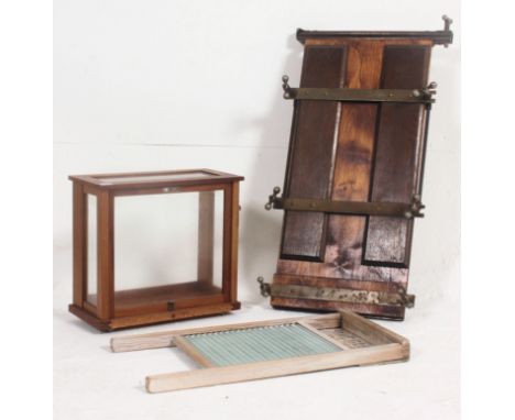 A vintage scientific scales case together with an Irish pine and glass washboard and a vintage mahogany trouser press. Measur