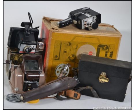 A collection of vintage camera and cine camera parts and accessories to include a cased 8mm cine camera, boxed projector, Pol