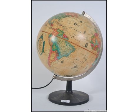 A contemporary late 20th century desk top globe with light up interior bearing makers name etc. Measures: 43cm H x 31cm diame