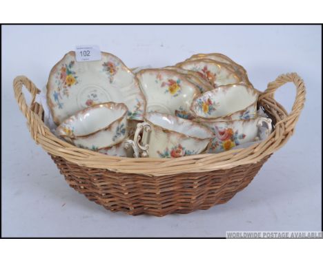 A 19th century Victorian China tea service with applied floral and gilt decoration, consisting of six trio's, and  RD 15053 t