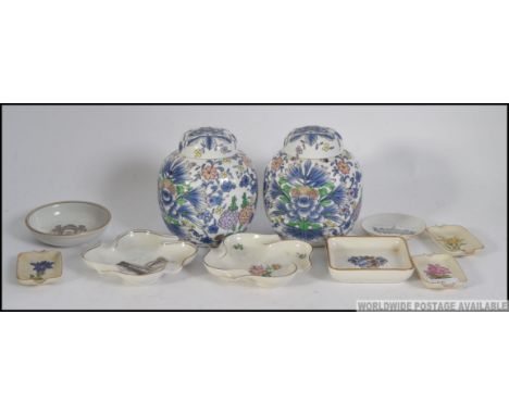 2 large foliate adorned Chinese ginger jars complete with the lids together with a selection of pin dishes of ceramic form. M