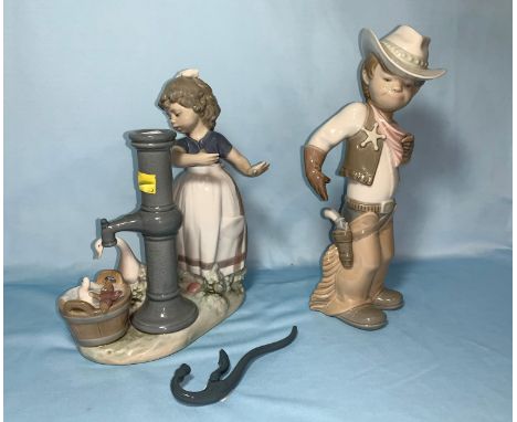 A Lladro figure - Boy in Cowboy outfit; a Lladro group - Girl by an old pump (handle detached) 
