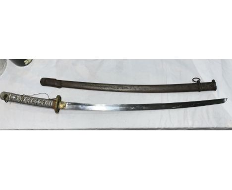 A World War two Japanese katana with metal scabbard and metal alloy handle blade numbered 28147 