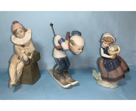 3 Lladro figures of children - boy clown, boy skiing, girl with flowers 