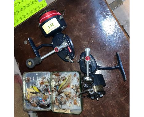 A vintage Mitchell Cap 304 reel and another Mitchell Garcia &amp; a selection of flies 