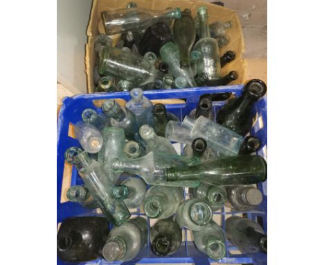 A collection of various vintage glass bottles