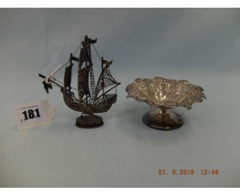 A white metal model of a galleon plus a small hallmarked silver dish 
