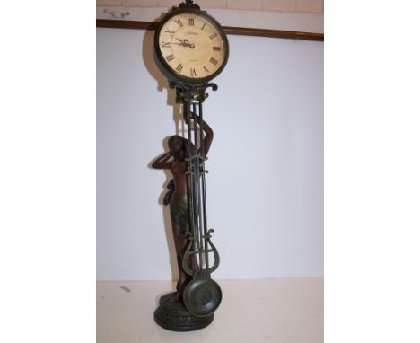 Large bronzed pendulum clock