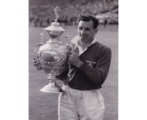 RUGBY LEAGUE  Two large press photographs showing Gus Risman playing his final match at the age of 41 for Workington Town in 