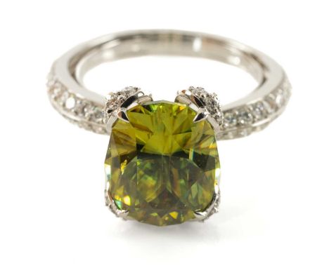 KAT FLORENCE 18K SPHENE & DIAMOND RING, oval SJP cut stone set within diamond bow loop claws above diamond girdle and double 