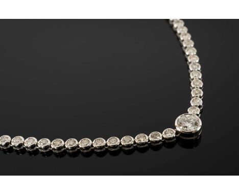 WHITE METAL DIAMOND LINE NECKLACE, set with central diamond (1.0cts approx.), with a further 101 diamonds (4.5-5.0cts approx.