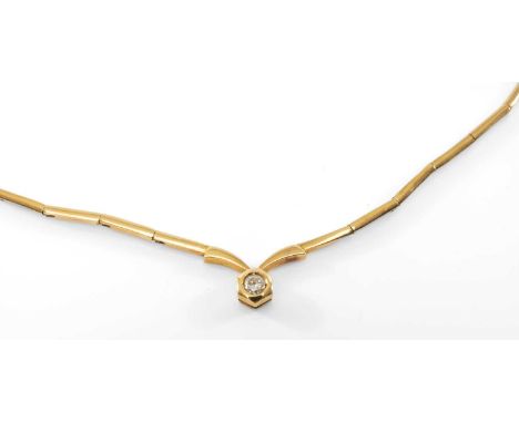 YELLOW METAL DIAMOND SET NECKLACE, the single stone (0.2cts approx.) in rub over setting, 40cms long, 12.6gmsProvenance: priv